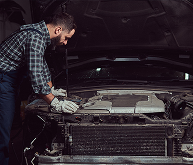 mechanic man uniform repairing car garage service station